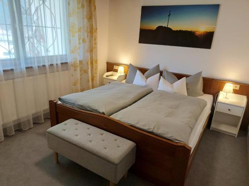 Ένα ή περισσότερα κρεβάτια σε δωμάτιο στο Haus Fischer