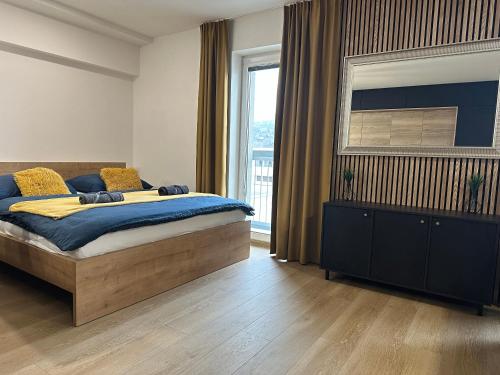 Ένα ή περισσότερα κρεβάτια σε δωμάτιο στο Penthouse Mountain City Equinox