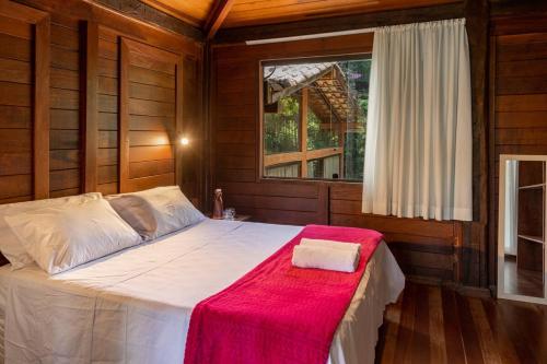 Postel nebo postele na pokoji v ubytování Casa Raul Macacos Suíte