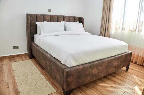 Ένα ή περισσότερα κρεβάτια σε δωμάτιο στο Juwell Haven