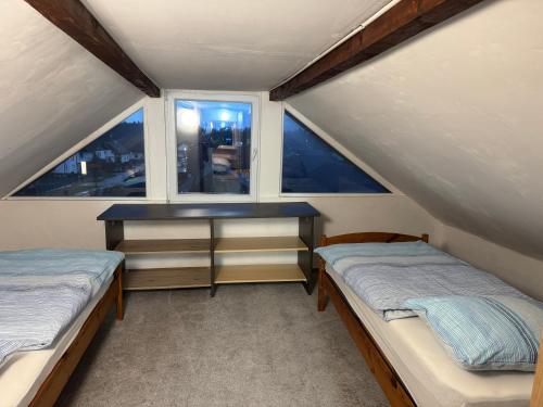 Postel nebo postele na pokoji v ubytování Apartments Zupan