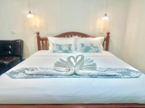 Voodi või voodid majutusasutuse Rungarun Residence toas