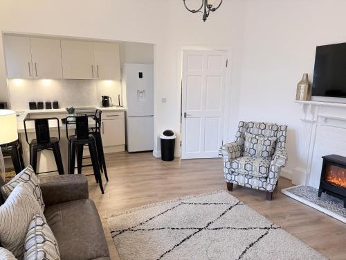 Η κουζίνα ή μικρή κουζίνα στο Prestwick serviced apartment