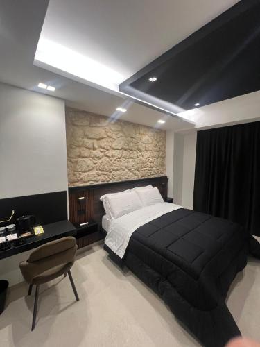 Giường trong phòng chung tại Il Moro Luxury Rooms