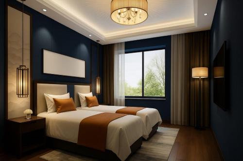 Ένα ή περισσότερα κρεβάτια σε δωμάτιο στο VanderLyn Blue Hotel