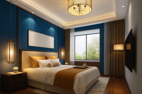 Ένα ή περισσότερα κρεβάτια σε δωμάτιο στο VanderLyn Blue Hotel