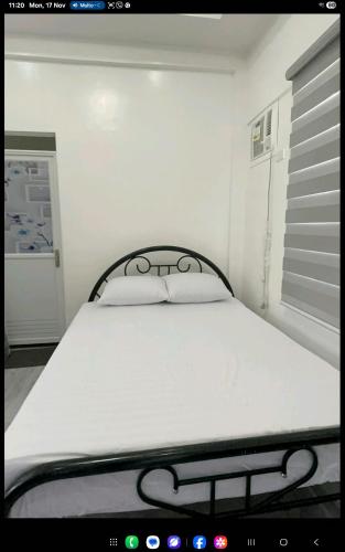 Ένα ή περισσότερα κρεβάτια σε δωμάτιο στο Room in Pinan ZDN