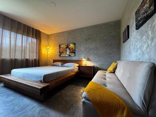 Ένα ή περισσότερα κρεβάτια σε δωμάτιο στο Villa Rivera