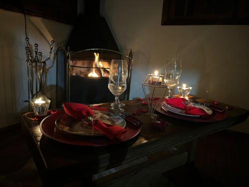 Drankjes bij Refúgio com Hidro, Lareira, Café da Manhã e Vista da Natureza