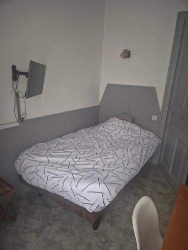 Ένα ή περισσότερα κρεβάτια σε δωμάτιο στο Le létilo