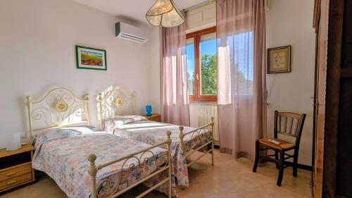 Postel nebo postele na pokoji v ubytování Casa Rurale