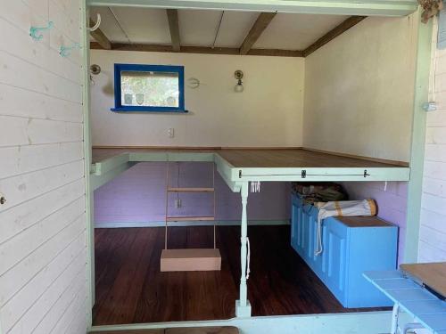 a room with a desk and a table in it at Little North Campground - Vacation STAY 69019v in Kajikazawa