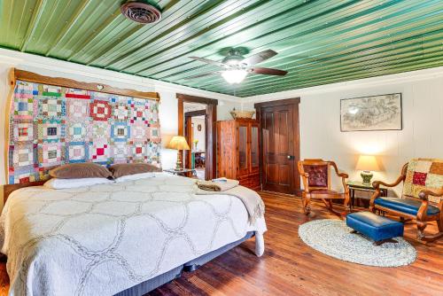 a bedroom with a bed and a green ceiling at Pet-Friendly Home with River Access in Crothersville in Scottsburg