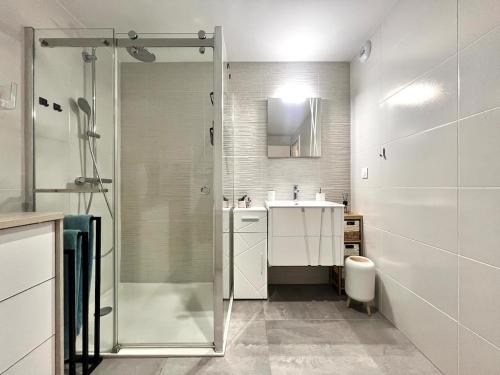 a bathroom with a shower and a sink at Modern Luxury - Sea View over Èze Village in Èze