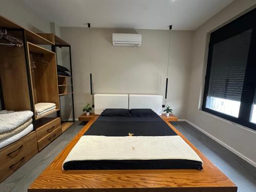 Ένα ή περισσότερα κρεβάτια σε δωμάτιο στο LT Luxury Villa