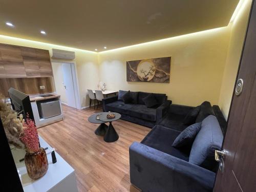 Ruang duduk di Cozy Apartament