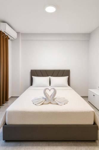 Llit o llits en una habitació de Tirana Panorama