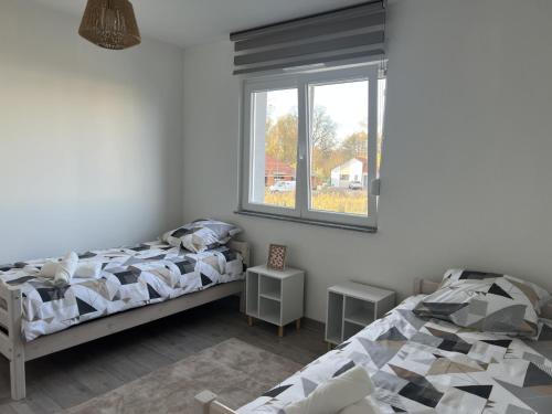 Postel nebo postele na pokoji v ubytování Chez Özlem