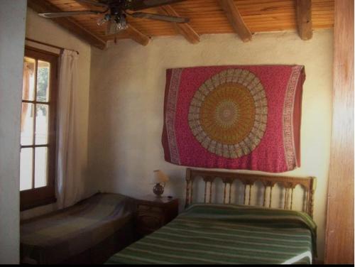 Postel nebo postele na pokoji v ubytování La Chakana