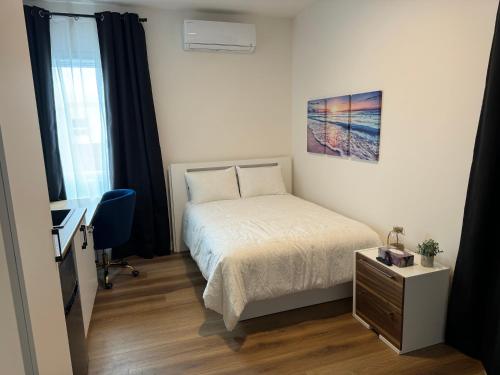 Postel nebo postele na pokoji v ubytování Loft Le Sommet