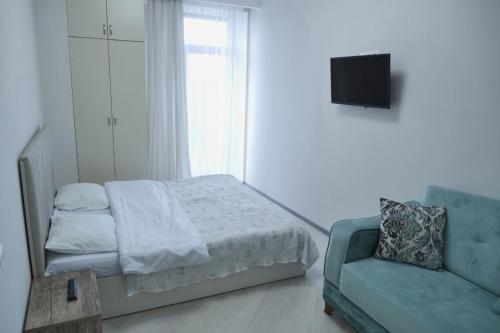 Ένα ή περισσότερα κρεβάτια σε δωμάτιο στο Aqua House In Tsakhkadzor