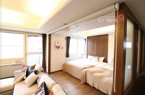 Ένα ή περισσότερα κρεβάτια σε δωμάτιο στο NK Building 7th and 8th floors - Vacation STAY 66284v