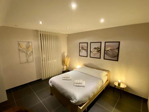 Postel nebo postele na pokoji v ubytování La Clé Des Monts