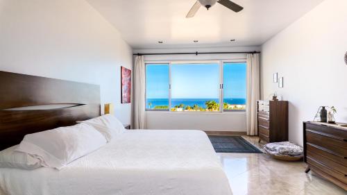 Ένα ή περισσότερα κρεβάτια σε δωμάτιο στο Spectacular 2 BR Oceanview Penthouse