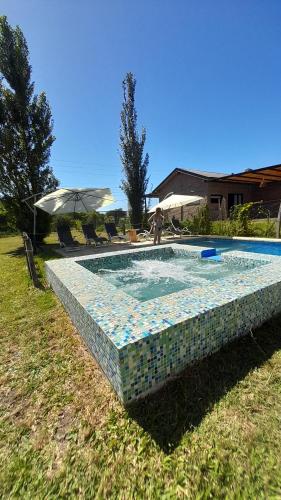 Bazén v ubytování Ayres de Giulias nebo v jeho okolí