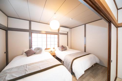 Voodi või voodid majutusasutuse Yokkaichi - House - Vacation STAY 82012v toas