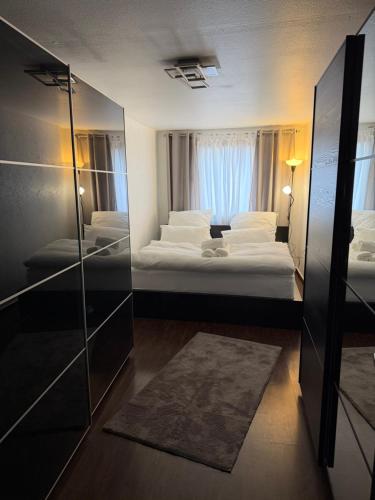 Postel nebo postele na pokoji v ubytování Be-Ta Apartament