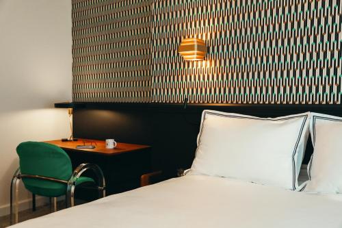 Postel nebo postele na pokoji v ubytování La Villa Maurice