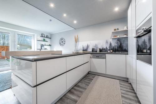 Kuchyň nebo kuchyňský kout v ubytování Relax Homedesign gemütliche Wohnung im Grünen in der Nähe von HH