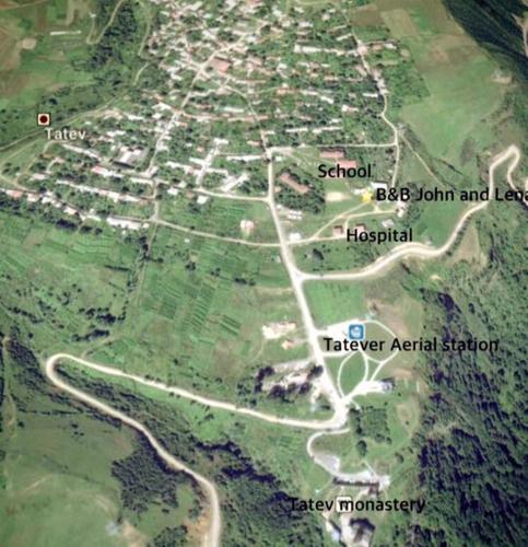 a map of a city with a street and a road at Bed and Breakfast John and Lena in Tatʼev