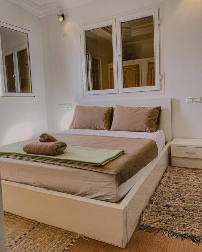 Postel nebo postele na pokoji v ubytování Dania Surf Appartement