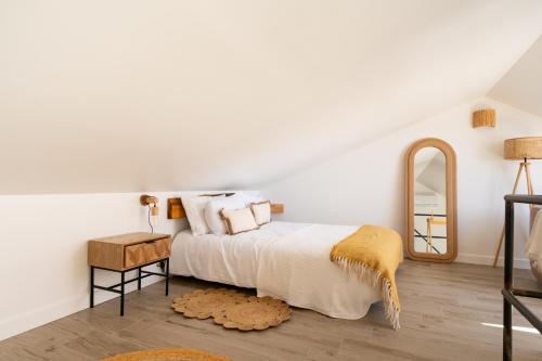 En eller flere senge i et værelse på Country House Vínicola