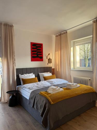 Postel nebo postele na pokoji v ubytování Apartament Staffa