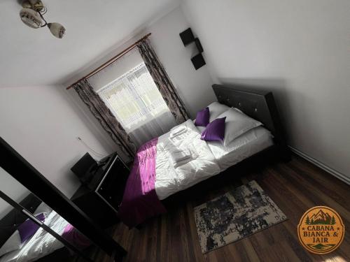 Postel nebo postele na pokoji v ubytování Cabana Bianca & Iair