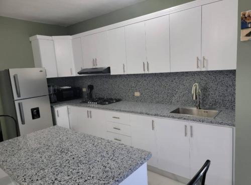 Kuchyň nebo kuchyňský kout v ubytování Desconecta para volver a conectar