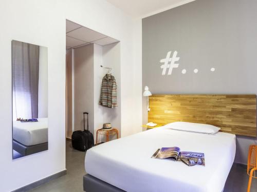Voodi või voodid majutusasutuse Ibis Styles Brindisi toas