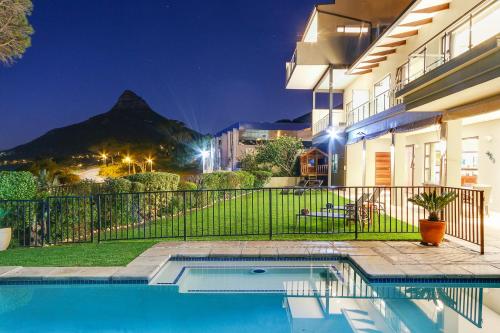 a large swimming pool in a residential area at Sea Mount in Cape Town