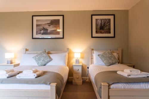 Postel nebo postele na pokoji v ubytování The Plough Inn