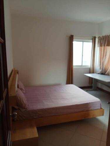 Postel nebo postele na pokoji v ubytování Gada House