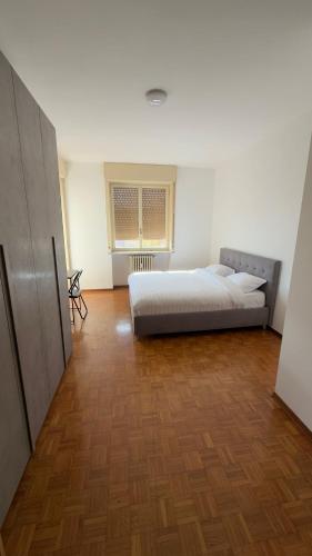 Ένα ή περισσότερα κρεβάτια σε δωμάτιο στο Genzianella