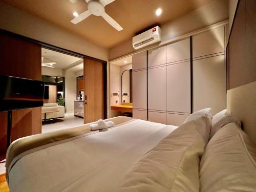 Postel nebo postele na pokoji v ubytování Antara Genting by J&H 1BR Suite 2-4 Pax