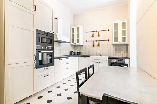 Acropolis 1910s Neoclassical Gem Marble Bathrooms