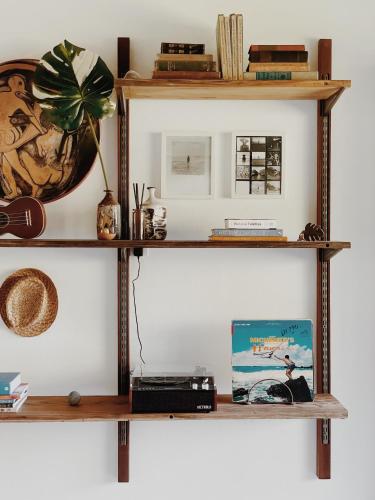 a shelf with a radio and a box on it at Loi B&B in Hilo