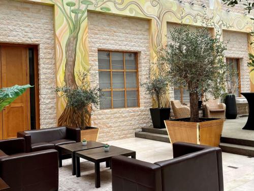 Χώρος καθιστικού στο Hotel des Colonies Brussels by Mercure