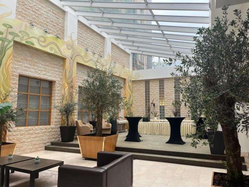 Aed väljaspool majutusasutust Hotel des Colonies Brussels by Mercure