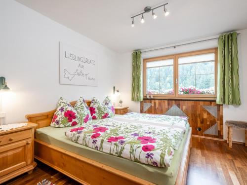 Postel nebo postele na pokoji v ubytování Haus am Waldrand